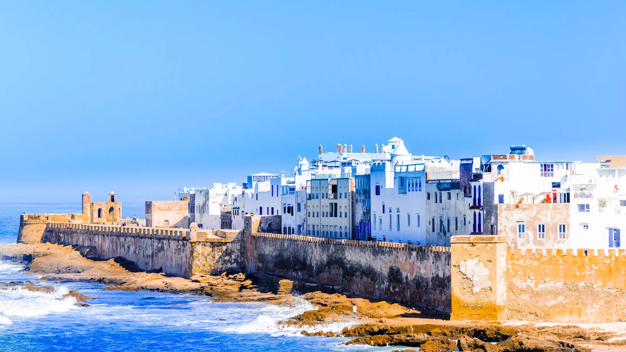 Beach and kitesurfers